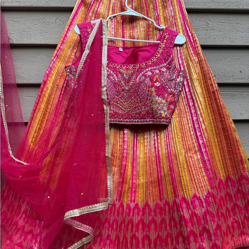Vibrant Pink and Gold Lehenga Choli